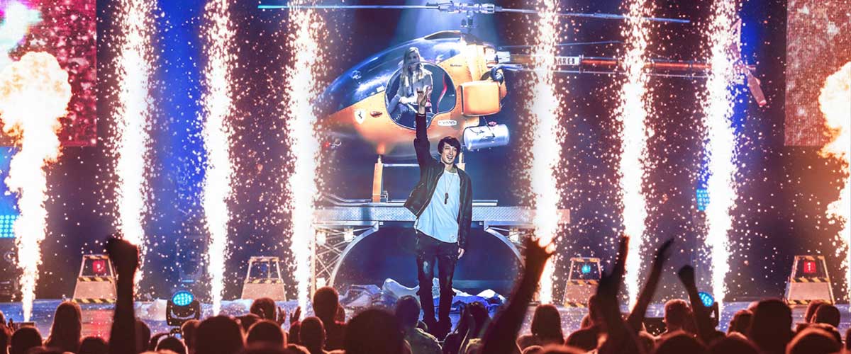 Reza performing on stage